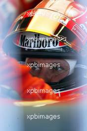 03.02.2003 Barcelona, Spanien, BCN, Formel1 Tests, Montag, Michael Schumacher (D), Scuderia Ferrari Marlboro, in der Box (Pit) - Circuit de Catalunya in Granollers bei Barcelona  (Februar, Testfahrten, Catalunia, Spain, Formel 1, F1, 2003)  c Copyright: Photos mit - xpb.cc - kennzeichnen, weitere Bilder auf der Bilddatenbank