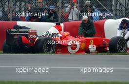 14.06.2003 Montreal, Kanada, CAN, Formel1, Samstag, Michael Schumacher (D, 01), Scuderia Ferrari Marlboro, F2003-GA, auf der Strecke (Track) nach seinem Ausrutscher (Unfall, Crash) - wird auf die Strecke zurück geschoben -  LEGAL NOTICE: THIS PICTURE IS NOT FOR UK (Great Britain, England...) PRINT USE, KEINE PRINT BILDNUTZUNG IN ENGLAND! - Formel 1 Grand Prix (GP) von Kanada 2003 auf dem Circuit Gilles Villeneuve, Ile Notre-Dame, Canada, Quebec, F1 - Weitere Bilder auf www.xpb.cc, eMail: info@xpb.cc - Belegexemplare senden. Abdruck ist honorarpflichtig. c Copyrightnachweis: xpb.cc