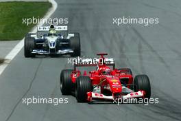 15.06.2003 Montreal, Kanada, CAN, Formel1, Sonntag, Michael Schumacher (D, 01), Scuderia Ferrari Marlboro, F2003-GA, auf der Strecke (Track) vor Ralf Schumacher (D, BMW WilliamsF1) - Formel 1 Grand Prix (GP) von Kanada 2003 auf dem Circuit Gilles Villeneuve, Ile Notre-Dame, Canada, Quebec, F1 - Weitere Bilder auf www.xpb.cc, eMail: info@xpb.cc - Belegexemplare senden. Abdruck ist honorarpflichtig. c Copyrightnachweis: photo4 / xpb.cc - LEGAL NOTICE: THIS PICTURE IS NOT FOR ITALY PRINT USE, KEINE PRINT BILDNUTZUNG IN ITALIEN!