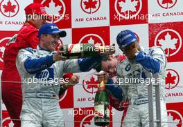 15.06.2003 Montreal, Kanada, CAN, Formel1, Sonntag, Podium, Ralf Schumacher (D, BMW WilliamsF1), Michael Schumacher (D, Ferrari), Juan-Pablo Montoya (CO, BMW WilliamsF1), C. Dyer - Formel 1 Grand Prix (GP) von Kanada 2003 auf dem Circuit Gilles Villeneuve, Ile Notre-Dame, Canada, Quebec, F1 - Weitere Bilder auf www.xpb.cc, eMail: info@xpb.cc - Belegexemplare senden. Abdruck ist honorarpflichtig. c Copyrightnachweis: xpb.cc