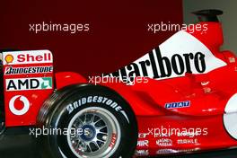 07.02.2003 Maranello, Italien, Ferrari, offizielle Formel1 Präsentation (Launch des F2003GA), Scuderia Ferrari Marlboro, in der neuen Logistik-Halle auf dem Gelände von Ferrari, TECHNIK FEATURE: Motorabdeckung mit Heckflügel und Seitenflügel, hinten - (Februar, Mugello, Italy, Formel 1, F1, 2003)  c Copyright: Photos mit - xpb.cc - kennzeichnen, weitere Bilder auf der Bilddatenbank