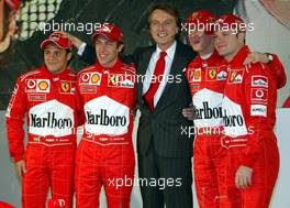 07.02.2003 Maranello, Italien, Ferrari, offizielle Formel1 Präsentation (Launch des F2003GA), Scuderia Ferrari Marlboro, in der neuen Logistik-Halle auf dem Gelände von Ferrari, hier: Felipe Massa, Luca Badoer, Luca di Montezemolo, (Ferrari, Präsident, Vorstand, Chairman & Managing Director), Michael Schumacher, Rubens Barrichello - (Februar, Mugello, Italy, Formel 1, F1, 2003)  c Copyright: Photos mit - xpb.cc - kennzeichnen, weitere Bilder auf der Bilddatenbank