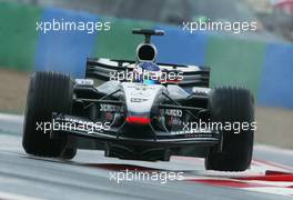 04.07.2003 Magny - Cours, Frankreich, F1, Freitag, Kimi Raikkonen, (Räikkönen, FIN, 06), West McLaren Mercedes, MP4-17D, auf der Strecke (Track)  - neue letzte Kurve - Magny - Cours, Circuit de Nevers, Formel 1 Grand Prix (GP) von Frankreich 2003, France, Nevers - Alle Bilder auf www.xpb.cc, eMail: info@xpb.cc - Abdruck ist honorarpflichtig. c Copyrightnachweis: xpb.cc
