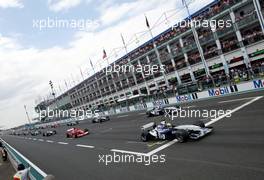 06.07.2003 Magny - Cours, Frankreich, F1, Sonntag, Start zum GP von Frankreich, Ralf Schumacher (D, BMW WilliamsF1), Juan-Pablo Montoya (CO, BMW WilliamsF1), Michael Schumacher (D, Ferrari), Kimi Raikkonen, (FIN, McLaren Mercedes) - Magny - Cours, Circuit de Nevers, Formel 1 Grand Prix (GP) von Frankreich 2003, France, Nevers - Alle Bilder auf www.xpb.cc, eMail: info@xpb.cc - Abdruck ist honorarpflichtig. c Copyrightnachweis: xpb.cc