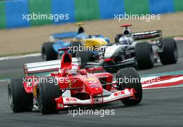 06.07.2003 Magny - Cours, Frankreich, F1, Sonntag, Rennen (Aktion), GP von Frankreich, Michael Schumacher (D, Ferrari), David Coulthard (GB, McLaren Mercedes), Jarno Trulli (I, 07), Mild Seven Renault F1 Team, R23, auf der Strecke (Track) - Magny - Cours, Circuit de Nevers, Formel 1 Grand Prix (GP) von Frankreich 2003, France, Nevers - Alle Bilder auf www.xpb.cc, eMail: info@xpb.cc - Abdruck ist honorarpflichtig. c Copyrightnachweis: xpb.cc