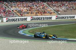 03.08.2003 Hockenheim, Deutschland, F1 am Hockenheimring, Rennen, Fernando Alonso (E, 08), Mild Seven Renault F1 Team, R23, auf der Strecke (Track) vor Michael Schumacher (D, Ferrari) - Sonntag, Formel 1 Grand Prix (GP), Großer Preis von Deutschland 2003 (Länge 4.574m, Baden Württemberg) - Alle Bilder auf www.xpb.cc, eMail: info@xpb.cc - Abdruck ist honorarpflichtig. c Copyrightnachweis: xpb.cc