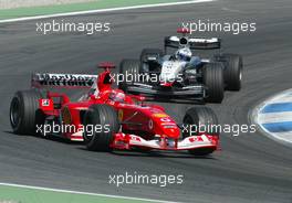 03.08.2003 Hockenheim, Deutschland, F1 am Hockenheimring, Rennen, Michael Schumacher (D, 01), Scuderia Ferrari Marlboro, F2003-GA, auf der Strecke (Track), David Coulthard (GB, McLaren Mercedes) - Sonntag, Formel 1 Grand Prix (GP), Großer Preis von Deutschland 2003 (Länge 4.574m, Baden Württemberg) - Alle Bilder auf www.xpb.cc, eMail: info@xpb.cc - Abdruck ist honorarpflichtig. c Copyrightnachweis: xpb.cc