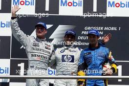 03.08.2003 Hockenheim, Deutschland, F1 am Hockenheimring, Podium, David Coulthard (GB, McLaren Mercedes), Juan-Pablo Montoya (CO, BMW WilliamsF1), Jarno Trulli (I, Renault F1 Team) - Sonntag, Formel 1 Grand Prix (GP), Großer Preis von Deutschland 2003 (Länge 4.574m, Baden Württemberg) - Alle Bilder auf www.xpb.cc, eMail: info@xpb.cc - Abdruck ist honorarpflichtig. c Copyrightnachweis: xpb.cc