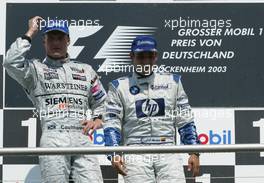 03.08.2003 Hockenheim, Deutschland, F1 am Hockenheimring, Podium, David Coulthard (GB, McLaren Mercedes), Juan-Pablo Montoya (CO, BMW WilliamsF1) - Sonntag, Formel 1 Grand Prix (GP), Großer Preis von Deutschland 2003 (Länge 4.574m, Baden Württemberg) - Alle Bilder auf www.xpb.cc, eMail: info@xpb.cc - Abdruck ist honorarpflichtig. c Copyrightnachweis: xpb.cc