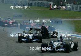 03.08.2003 Hockenheim, Deutschland, F1 am Hockenheimring, Start zum GP von Deutschland, CRASH / Unfall von Kimi Raikkonen, (Räikkönen, FIN, 06), West McLaren Mercedes, MP4-17D, auf der Strecke (Track) - Sonntag, Formel 1 Grand Prix (GP), Großer Preis von Deutschland 2003 (Länge 4.574m, Baden Württemberg) - Alle Bilder auf www.xpb.cc, eMail: info@xpb.cc - Abdruck ist honorarpflichtig. c Copyrightnachweis: photo4 / xpb.cc - LEGAL NOTICE: THIS PICTURE IS NOT FOR ITALY PRINT USE, KEINE PRINT BILDNUTZUNG IN ITALIEN!