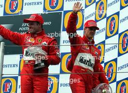 20.04.2003 Imola, San Marino, SM, Formel1, Sonntag (Ostern), Podium, Michael Schumacher (D, Ferrari) mit Trauerbinde, Rubens Barrichello (BR, Ferrari) - (Imola, Autodromo Enzo e Dino Ferrari, 4,933 km - Grand Prix of San Marino 2003, Formel 1, F1) -  LEGAL NOTICE: THIS PICTURES ARE NOT FOR UK (Great Britain, England...) PRINT USE, KEINE BILDNUTZUNG - PRINT - IN ENGLAND!  - Weitere Bilder auf www.xpb.cc, eMail: info@xpb.cc - Belegexemplare senden. Abdruck ist honorarpflichtig. c Copyrightnachweis: xpb.cc