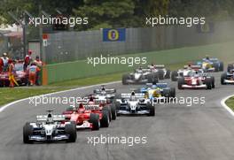 20.04.2003 Imola, San Marino, SM, Formel1, Sonntag (Ostern), Start zum GP vom San Marino, Ralf Schumacher (D, 04), BMW WilliamsF1 Team, FW25, auf der Strecke (Track) vor Michael Schumacher (D, Ferrari), Rubens Barrichello (BR, Ferrari), Juan-Pablo Montoya (CO, BMW WilliamsF1)  - (Rennen, Imola, Autodromo Enzo e Dino Ferrari, 4,933 km - Grand Prix of San Marino 2003, Formel 1, F1)  - Weitere Bilder auf www.xpb.cc, eMail: info@xpb.cc - Belegexemplare senden. Abdruck ist honorarpflichtig. c Copyrightnachweis: xpb.cc