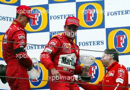 20.04.2003 Imola, San Marino, SM, Formel1, Sonntag (Ostern), Podium, Michael Schumacher (D, Ferrari) mit Trauerbinde, Rubens Barrichello (BR, Ferrari), Jean Todt (Ferrari, Teamchef, General Manager, GES), Portrait - (Imola, Autodromo Enzo e Dino Ferrari, 4,933 km - Grand Prix of San Marino 2003, Formel 1, F1)  - Weitere Bilder auf www.xpb.cc, eMail: info@xpb.cc - Belegexemplare senden. Abdruck ist honorarpflichtig. c Copyrightnachweis: xpb.cc