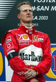 20.04.2003 Imola, San Marino, SM, Formel1, Sonntag (Ostern), Podium, Michael Schumacher (D, Ferrari) mit Trauerbinde - (Imola, Autodromo Enzo e Dino Ferrari, 4,933 km - Grand Prix of San Marino 2003, Formel 1, F1)  - Weitere Bilder auf www.xpb.cc, eMail: info@xpb.cc - Belegexemplare senden. Abdruck ist honorarpflichtig. c Copyrightnachweis: xpb.cc