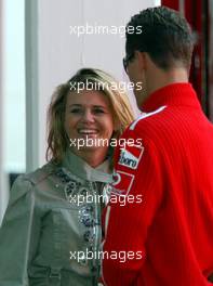 17.04.2003 Imola, San Marino, SM, Formel1, Donnerstag, Michael Schumacher (D, Ferrari) und seine Frau Corinna auf dem Roller / Scooter - Portrait - (Imola, Autodromo Enzo e Dino Ferrari, 4,933 km - Grand Prix of San Marino 2003, Formel 1, F1)  - Weitere Bilder auf www.xpb.cc, eMail: info@xpb.cc - Belegexemplare senden. Abdruck ist honorarpflichtig. c Copyrightnachweis: xpb.cc