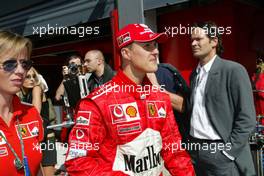 13.09.2003 Monza, Italien, F1 in Monza, Samstag, Michael Schumacher (D, Ferrari) Portrait, nach seiner Pole Position - Formel 1 Grand Prix (GP) von Italien 2003 (Autodromo Nazionale Monza, Italy) - Weitere Bilder auf www.xpb.cc, eMail: info@xpb.cc - Belegexemplare senden. Abdruck ist honorarpflichtig. c Copyrightnachweis: xpb.cc