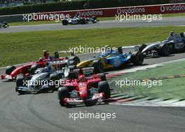 14.09.2003 Monza, Italien, F1 in Monza, Sonntag, Start zum Rennen, Michael Schumacher (D, Ferrari) vor Juan-Pablo Montoya (CO, BMW WilliamsF1), Rubens Barrichello (BR, Ferrari), Jarno Trulli (I, Renault F1 Team), Kimi Raikkonen, (FIN, McLaren Mercedes) - Formel 1 Grand Prix (GP) von Italien 2003 (Autodromo Nazionale Monza, Italy) - Weitere Bilder auf www.xpb.cc, eMail: info@xpb.cc - Belegexemplare senden. Abdruck ist honorarpflichtig. c Copyrightnachweis: xpb.cc