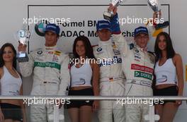 08.06.2003 Klettwitz, Deutschland, Podium, Robert Kath (GER), ADAC Sachsen e.V. (1st, center), Timo Lienemann (GER), Mücke Motorsport (2nd, left), Maximilian Götz (GER), Mücke Motorsport (3rd, right) and the ADAC girls - Formel BMW ADAC Meisterschaft 2003 in Klettwitz, EuroSpeedway Lausitz, Lausitzring (Formel BMW ADAC Meisterschaft)  - Weitere Bilder auf www.xpb.cc, eMail: info@xpb.cc - Belegexemplare senden. c Copyright: Kennzeichnung mit: Miltenburg / xpb.cc