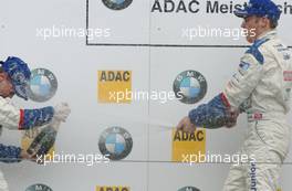 25.05.2003 Nürburg, Deutschland, Podium, Maximilian Götz (GER), Mücke Motorsport, and Sebastian Vettel (GER), Eifelland Racing, spraying champaign - Formel BMW ADAC Meisterschaft 2003 in Nürburg, Grand-Prix-Kurs des Nürburgring (Formel BMW ADAC Meisterschaft)  - Weitere Bilder auf www.xpb.cc, eMail: info@xpb.cc - Belegexemplare senden. c Copyright: Kennzeichnung mit: Miltenburg / xpb.cc