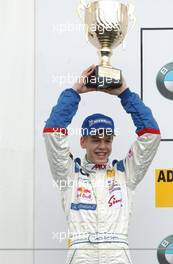 25.05.2003 Nürburg, Deutschland, Podium, Sebastian Vettel (GER), Eifelland Racing (2nd), holding up the trophy - Formel BMW ADAC Meisterschaft 2003 in Nürburg, Grand-Prix-Kurs des Nürburgring (Formel BMW ADAC Meisterschaft)  - Weitere Bilder auf www.xpb.cc, eMail: info@xpb.cc - Belegexemplare senden. c Copyright: Kennzeichnung mit: Miltenburg / xpb.cc