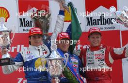 10.08.2003 Zandvoort, Die Niederlande, Podium, Christian Klien (AUT), ADAC Berlin-Brandenburg (1st, center), Nelson Piquet Jr. (BRA), Piquet Sports (2nd, left), and Ryan Briscoe (AUS), Prema Powerteam Srl (3rd, right) - Marlboro Masters of Formula 3 (2003) in Zandvoort, Circuit Park Zandvoort (Formel 3)  - Weitere Bilder auf www.xpb.cc, eMail: info@xpb.cc - Belegexemplare senden. c Copyright: Kennzeichnung mit: Miltenburg / xpb.cc