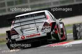 15.05.2004 Adria, Italy,  DTM, Saturday, The car of Bernd Schneider (GER), Vodafone AMG-Mercedes, AMG-Mercedes C-Klasse, hitting the ground at the chicane - DTM Season 2004 at Adria International Raceway (Deutsche Tourenwagen Masters, Italy)