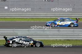 16.05.2004 Adria, Italy,  DTM, Sunday, Laurent Aiello (FRA), OPC Team Phoenix, Opel Vectra GTS V8 (left) and Manuel Reuter (GER), OPC Team Holzer, Opel Vectra GTS V8, going in opposite directions - DTM Season 2004 at Adria International Raceway (Deutsche Tourenwagen Masters, Italy)