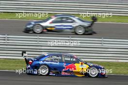 16.05.2004 Adria, Italy,  DTM, Sunday, Pole sitter Mattias Ekström (SWE), Audi Sport Team Abt, Audi A4 DTM (bottom), faces tough competition from championship leader Christijan Albers (NED), DaimlerChrysler Bank AMG-Mercedes, AMG-Mercedes C-Klasse (top) - DTM Season 2004 at Adria International Raceway (Deutsche Tourenwagen Masters, Italy)