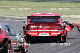 16.05.2004 Adria, Italy,  DTM, Sunday, Heinz-Harald Frentzen (GER), OPC Team Holzer, Opel Vectra GTS V8, looses a big part of the body work after hitting one of the tyre barriers in the chicane while in close battle with Bernd Schneider (GER), Vodafone AMG-Mercedes, AMG-Mercedes C-Klasse - DTM Season 2004 at Adria International Raceway (Deutsche Tourenwagen Masters, Italy)