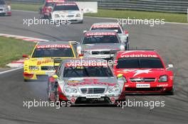 16.05.2004 Adria, Italy,  DTM, Sunday, Bernd Schneider (GER), Vodafone AMG-Mercedes, AMG-Mercedes C-Klasse, fighitng hard with Heinz-Harald Frentzen (GER), OPC Team Holzer, Opel Vectra GTS V8 - DTM Season 2004 at Adria International Raceway (Deutsche Tourenwagen Masters, Italy)