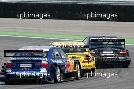 16.05.2004 Adria, Italy,  DTM, Sunday, Mattias Ekström (SWE), Audi Sport Team Abt, Audi A4 DTM (last of the three), once again being held up by the one-year-old Mercedes', this time from Bernd Mayländer (GER), CLK AMG-Mercedes, Mercedes CLK-DTM (front) and Jarek Janis (CZE), Sonax Dark Dog AMG-Mercedes, Mercedes CLK-DTM (middle) - DTM Season 2004 at Adria International Raceway (Deutsche Tourenwagen Masters, Italy)