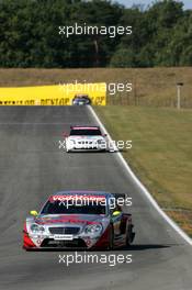 17.09.2004 Brno, Czech Republic,  DTM, Friday, Bernd Schneider (GER), Vodafone AMG-Mercedes, AMG-Mercedes C-Klasse, in front of Peter Dumbreck (GBR), OPC Team Phoenix, Opel Vectra GTS V8 and Gary Paffett (GBR), C-Klasse AMG-Mercedes, AMG-Mercedes C-Klasse - DTM Season 2004 at Automotodrom Brno, Czech Republic (Deutsche Tourenwagen Masters)