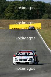 17.09.2004 Brno, Czech Republic,  DTM, Friday, Peter Dumbreck (GBR), OPC Team Phoenix, Opel Vectra GTS V8, in front of Gary Paffett (GBR), C-Klasse AMG-Mercedes, AMG-Mercedes C-Klasse - DTM Season 2004 at Automotodrom Brno, Czech Republic (Deutsche Tourenwagen Masters)