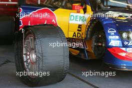 18.09.2004 Brno, Czech Republic,  DTM, Saturday, A tyre in a tyre warmer waiting to be mounted on the car of Mattias Ekström (SWE), Audi Sport Team Abt, Audi A4 DTM - DTM Season 2004 at Automotodrom Brno, Czech Republic (Deutsche Tourenwagen Masters)