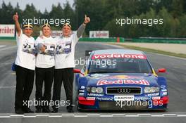 19.09.2004 Brno, Czech Republic,  DTM, Sunday, Audi group picture with new 2004 DTM champion Mattias Ekström (SWE), Audi Sport Team Abt, Audi A4 DTM (center), Hans-Jurgen Abt (GER), Teamchef Abt-Audi (left) and Dr. Wolfgang Ullrich (GER), Audi's Head of Sport (right) - DTM Season 2004 at Automotodrom Brno, Czech Republic (Deutsche Tourenwagen Masters)