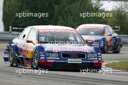 19.09.2004 Brno, Czech Republic,  DTM, Sunday, Mattias Ekström (SWE), Audi Sport Team Abt, Audi A4 DTM, leading in front of Martin Tomczyk (GER), Audi Sport Team Abt, Audi A4 DTM - DTM Season 2004 at Automotodrom Brno, Czech Republic (Deutsche Tourenwagen Masters)