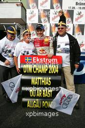 19.09.2004 Brno, Czech Republic,  DTM, Sunday, Newly crowned 2004 DTM champion Mattias Ekström (SWE), Audi Sport Team Abt, Portrait, with his father, mother and his closest friend - DTM Season 2004 at Automotodrom Brno, Czech Republic (Deutsche Tourenwagen Masters)