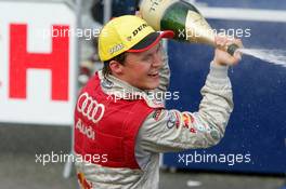 19.09.2004 Brno, Czech Republic,  DTM, Sunday, Mattias Ekström (SWE), Audi Sport Team Abt, Portrait (1st), spraying champaign to his team - DTM Season 2004 at Automotodrom Brno, Czech Republic (Deutsche Tourenwagen Masters)