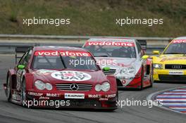 19.09.2004 Brno, Czech Republic,  DTM, Sunday, Stefan Mücke (GER), CLK AMG-Mercedes, Mercedes CLK-DTM, in front of Bernd Schneider (GER), Vodafone AMG-Mercedes, AMG-Mercedes C-Klasse and Tom Kristensen (DNK), Audi Sport Team Abt Sportsline, Audi A4 DTM - DTM Season 2004 at Automotodrom Brno, Czech Republic (Deutsche Tourenwagen Masters)