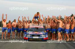 19.09.2004 Brno, Czech Republic,  DTM, Sunday, Audi group picture to celebrate the 2004 DTM championship of Mattias Ekström (SWE), Audi Sport Team Abt (center), with all team members including all drivers and team management, almost naked, just with shorts - DTM Season 2004 at Automotodrom Brno, Czech Republic (Deutsche Tourenwagen Masters)