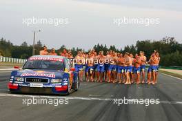 19.09.2004 Brno, Czech Republic,  DTM, Sunday, Audi group picture to celebrate the 2004 DTM championship of Mattias Ekström (SWE), Audi Sport Team Abt (center), with all team members including all drivers and team management, almost naked, just with shorts - DTM Season 2004 at Automotodrom Brno, Czech Republic (Deutsche Tourenwagen Masters)