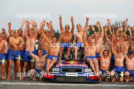 19.09.2004 Brno, Czech Republic,  DTM, Sunday, Audi group picture to celebrate the 2004 DTM championship of Mattias Ekström (SWE), Audi Sport Team Abt (center), with all team members including all drivers and team management, almost naked, just with shorts - DTM Season 2004 at Automotodrom Brno, Czech Republic (Deutsche Tourenwagen Masters)