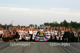 19.09.2004 Brno, Czech Republic,  DTM, Sunday, Audi group picture with new 2004 DTM champion Mattias Ekström (SWE), Audi Sport Team Abt, Audi A4 DTM - DTM Season 2004 at Automotodrom Brno, Czech Republic (Deutsche Tourenwagen Masters)