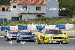 02.05.2004 Estoril, Portugal,  DTM, Sunday, Tom Kristensen (DNK), Audi Sport Team Abt Sportsline, Audi A4 DTM, in front of Martin Tomczyk (GER), Audi Sport Team Abt, Audi A4 DTM, and Bernd Schneider (GER), Vodafone AMG-Mercedes, AMG-Mercedes C-Klasse - DTM Season 2004 at Circuito do Estoril (Deutsche Tourenwagen Masters, Portugal)