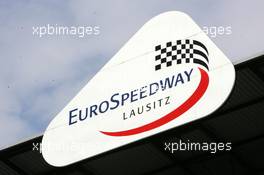 04.06.2004 Klettwitz, Germany,  DTM, Friday, EuroSpeedway Lausitzring sign on the roof of the grandstand - DTM Season 2004 at Lausitzring (Deutsche Tourenwagen Masters)