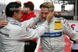 05.06.2004 Klettwitz, Germany,  DTM, Saturday, Jean Alesi (FRA), AMG-Mercedes, AMG-Mercedes C-Klasse (left), congratulating Christijan Albers (NED), DaimlerChrysler Bank AMG-Mercedes, Portrait (right), with his first pole position - DTM Season 2004 at Lausitzring (Deutsche Tourenwagen Masters)