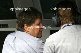 05.06.2004 Klettwitz, Germany,  DTM, Saturday, Norbert Haug (GER), Sporting Director Mercedes-Benz (left) and Hans-Jürgen Mattheis (GER), Team Manager HWA (right) at the pitwall stand - DTM Season 2004 at Lausitzring (Deutsche Tourenwagen Masters)