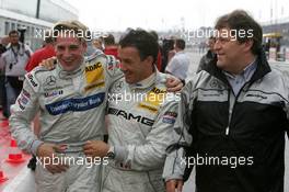 05.06.2004 Klettwitz, Germany,  DTM, Saturday, Polesitter Christijan Albers (NED), DaimlerChrysler Bank AMG-Mercedes, Portrait (left), with Jean Alesi (FRA), AMG-Mercedes, Portrait (center) and Norbert Haug (GER), Sporting Director Mercedes-Benz - DTM Season 2004 at Lausitzring (Deutsche Tourenwagen Masters)