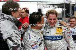 05.06.2004 Klettwitz, Germany,  DTM, Saturday, Jean Alesi (FRA), AMG-Mercedes, Portrait (center), congratulates Christijan Albers (NED), DaimlerChrysler Bank AMG-Mercedes, Portrait (right), with his first pole position. Left: Norbert Haug (GER), Sporting Director Mercedes-Benz - DTM Season 2004 at Lausitzring (Deutsche Tourenwagen Masters)