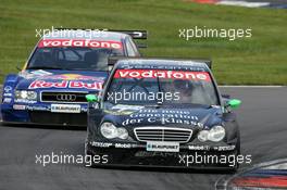 06.06.2004 Klettwitz, Germany,  DTM, Sunday, Gary Paffett (GBR), C-Klasse AMG-Mercedes, AMG-Mercedes C-Klasse, was lucky to get out of the pits just in front of Martin Tomczyk (GER), Audi Sport Team Abt, Audi A4 DTM - DTM Season 2004 at Lausitzring (Deutsche Tourenwagen Masters)